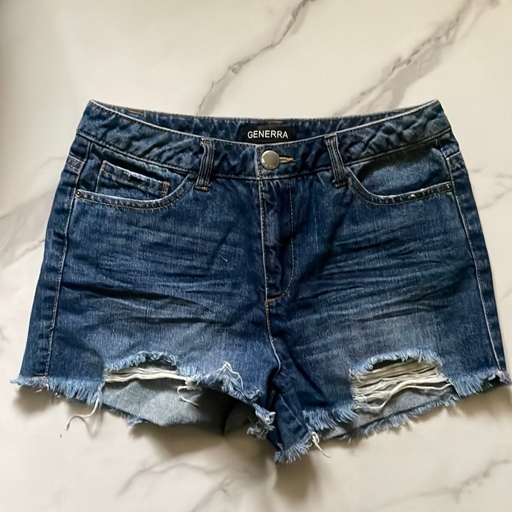 Barley Used- High Rise denim shorts. Size is a 05.
